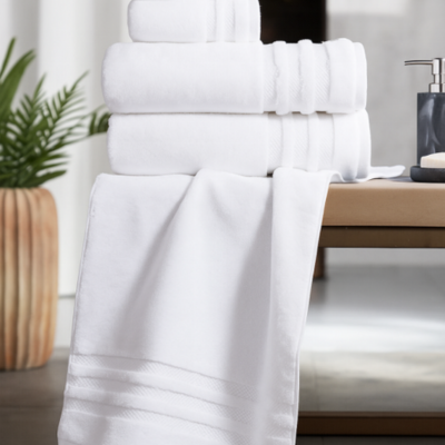 Stack of plush white bath towels