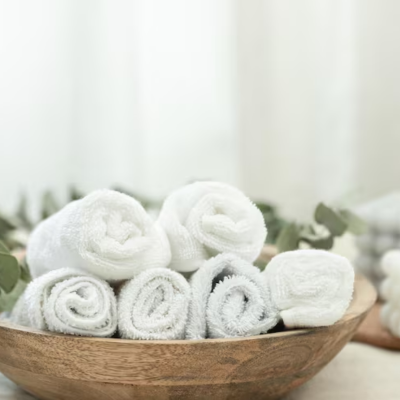 Bath towels folded on a spa bench