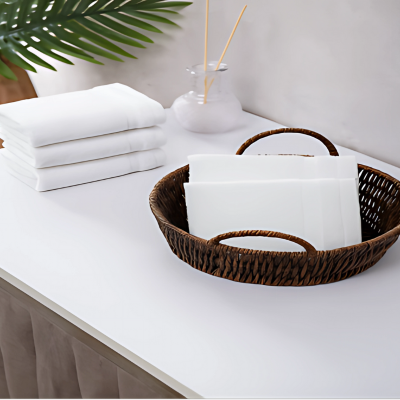Face towels stacked with amenities